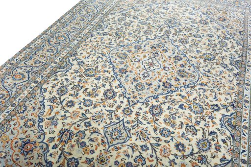 Backside of handmade 2000s Kashan rug showing knot structure and weave density