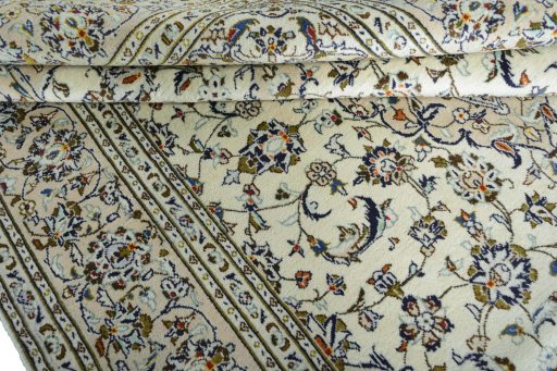 Close-up detail of New Kashan rug from Iran / Persia showing Wool weave
