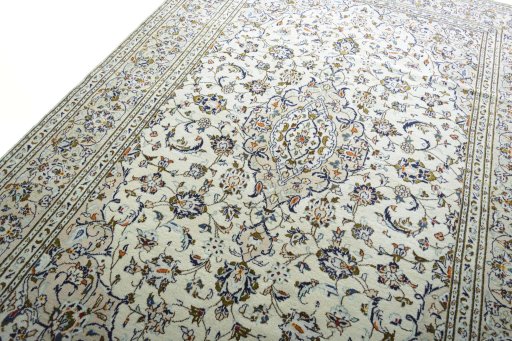 Backside of handmade New Kashan rug showing knot structure and weave density