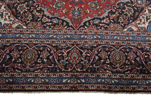 Full view of 2000s Kashan rug from Iran / Persia, 427 × 298 cm in Red tones