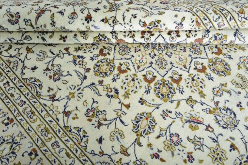 Close-up detail of New Kashan rug from Iran / Persia showing Wool weave