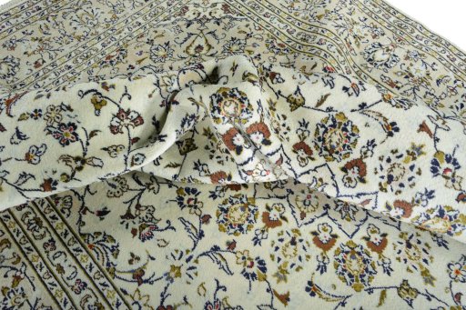 Surface texture of New Kashan rug with natural Wool and intricate pattern