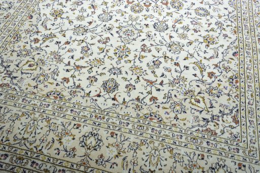 Close-up detail of New Kashan rug from Iran / Persia showing Wool weave