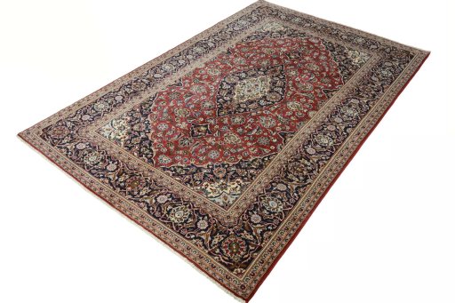 Corner detail of 2000s Kashan rug showing border pattern and Wool pile