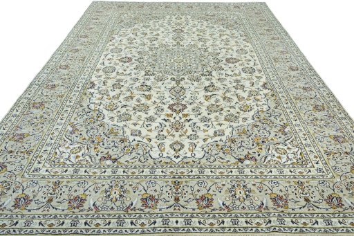 Surface texture of 2000s Kashan rug with natural Wool and intricate pattern