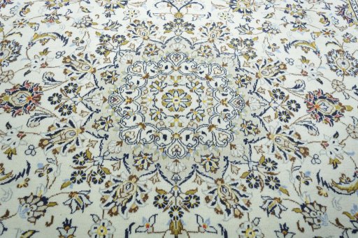 Central medallion detail of 2000s Kashan rug from Iran / Persia