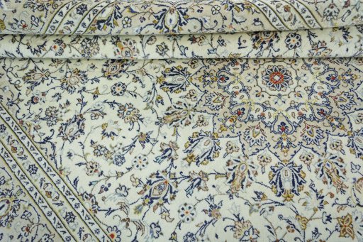 Close-up detail of 2000s Kashan rug from Iran / Persia showing Wool weave