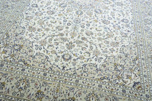 Close-up detail of 2000s Kashan rug from Iran / Persia showing Wool weave