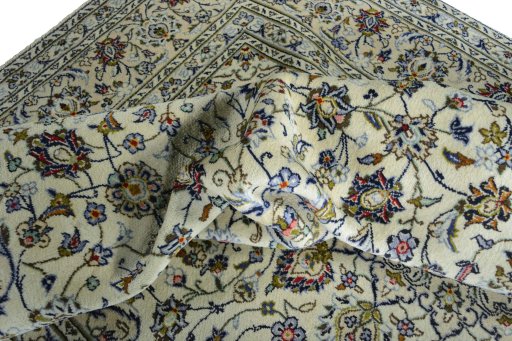 Surface texture of 2000s Kashan rug with natural Wool and intricate pattern