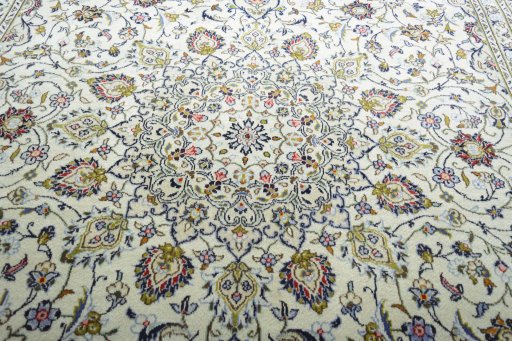 Central medallion detail of 2000s Kashan rug from Iran / Persia
