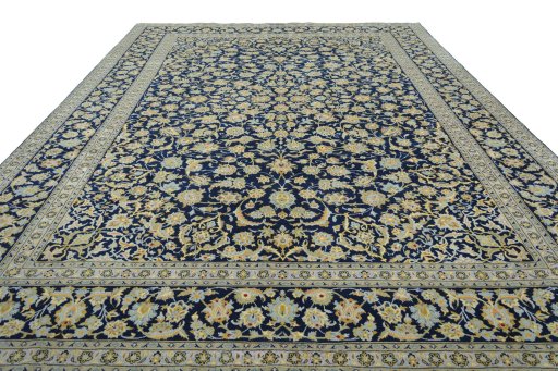 Surface texture of 2000s Kashan rug with natural Wool and intricate pattern