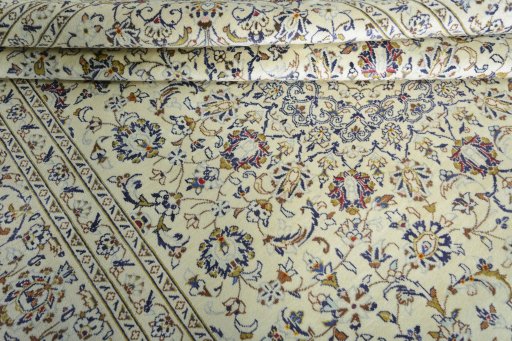 Close-up detail of 2000s Kashan rug from Iran / Persia showing Wool weave