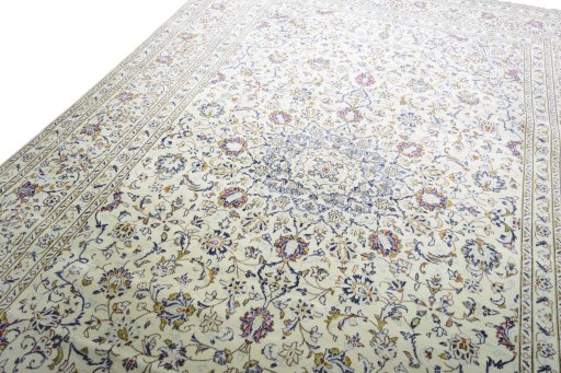 Backside of handmade 2000s Kashan rug showing knot structure and weave density