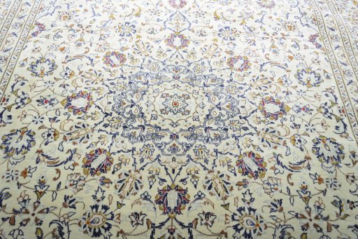 Central medallion detail of 2000s Kashan rug from Iran / Persia
