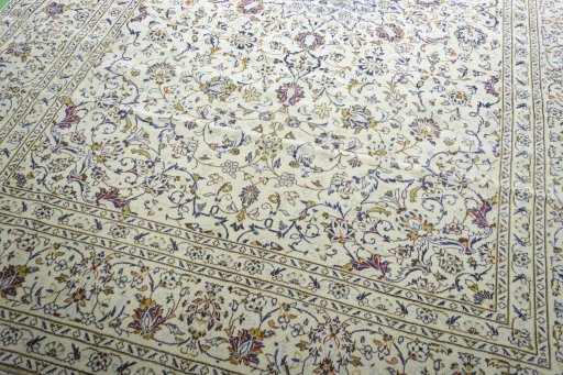 Close-up detail of 2000s Kashan rug from Iran / Persia showing Wool weave