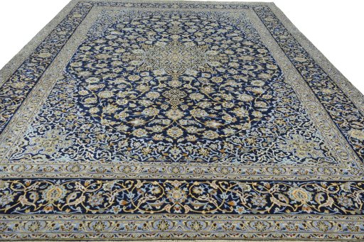 Surface texture of 2000s Kashan rug with natural Wool and intricate pattern
