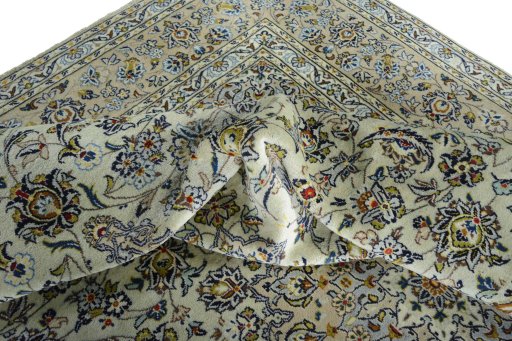 Surface texture of 2000s Kashan rug with natural Wool and intricate pattern
