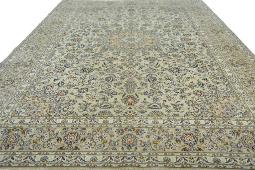 Surface texture of 2000s Kashan rug with natural Wool and intricate pattern