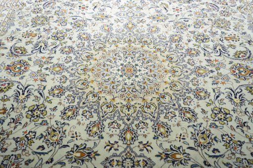 Central medallion detail of 2000s Kashan rug from Iran / Persia