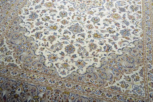 Close-up detail of 2000s Kashan rug from Iran / Persia showing Wool weave
