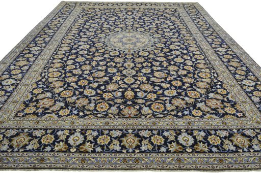 Surface texture of 2000s Kashan rug with natural Wool and intricate pattern