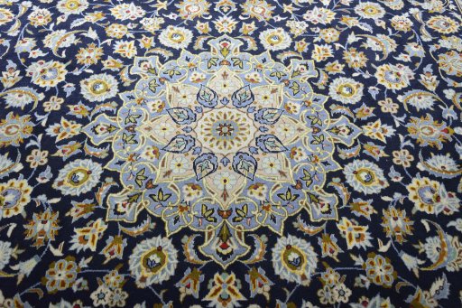 Central medallion detail of 2000s Kashan rug from Iran / Persia