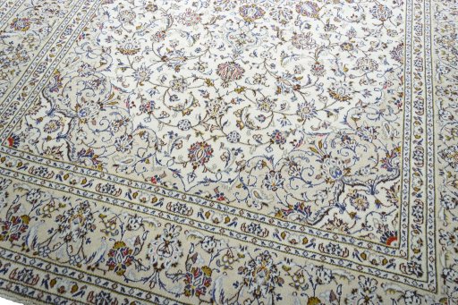 Close-up detail of 2000s Kashan rug from Iran / Persia showing Wool weave