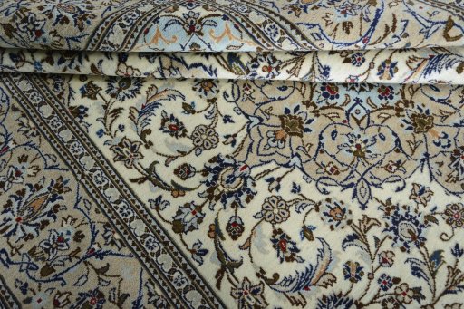 Close-up detail of 2000s Kashan rug from Iran / Persia showing Wool weave