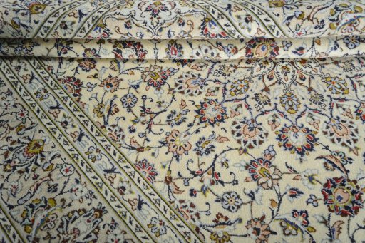 Close-up detail of 2000s Kashan rug from Iran / Persia showing Wool weave