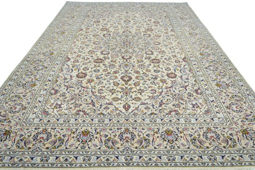 Surface texture of 2000s Kashan rug with natural Wool and intricate pattern