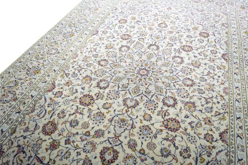 Backside of handmade 2000s Kashan rug showing knot structure and weave density