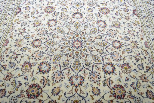 Central medallion detail of 2000s Kashan rug from Iran / Persia