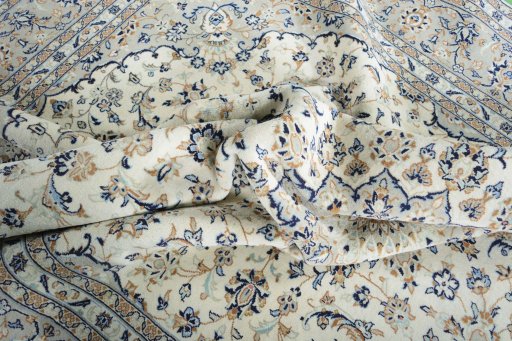 Surface texture of New Kashan rug with natural Wool and intricate pattern