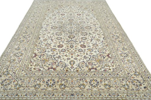 Surface texture of 2000s Kashan rug with natural Wool and intricate pattern