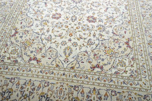 Close-up detail of 2000s Kashan rug from Iran / Persia showing Wool weave