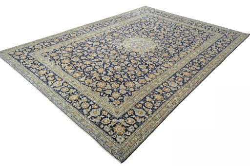 Corner detail of 2000s Kashan rug showing border pattern and Wool pile