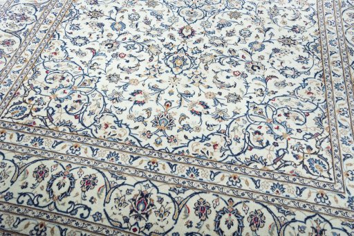 Close-up detail of 2000s Kashan rug from Iran / Persia showing Wool weave