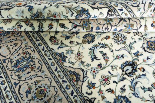 Close-up detail of New Kashan rug from Iran / Persia showing Wool weave
