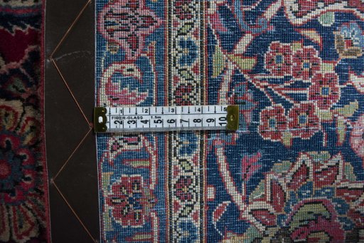 Central medallion detail of 1930s Kashan rug from Iran / Persia