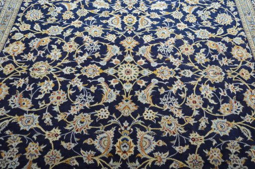 Central medallion detail of 2000s Kashan rug from Iran / Persia