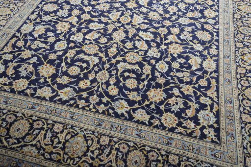 Close-up detail of 2000s Kashan rug from Iran / Persia showing Wool weave