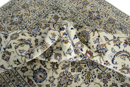 Surface texture of New Kashan rug with natural Wool and intricate pattern