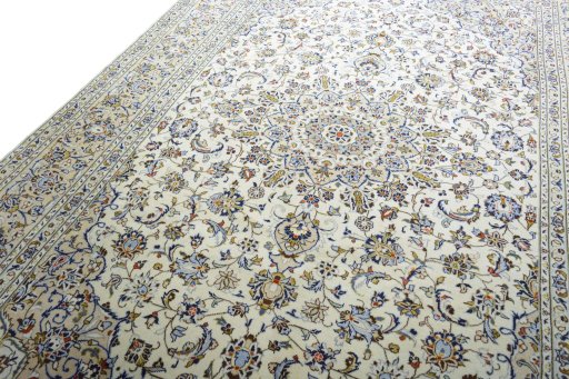 Backside of handmade New Kashan rug showing knot structure and weave density