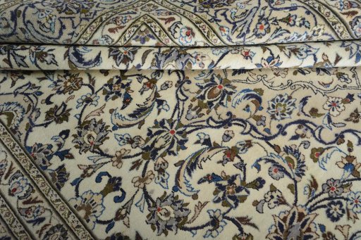 Close-up detail of 2000s Kashan rug from Iran / Persia showing Wool weave