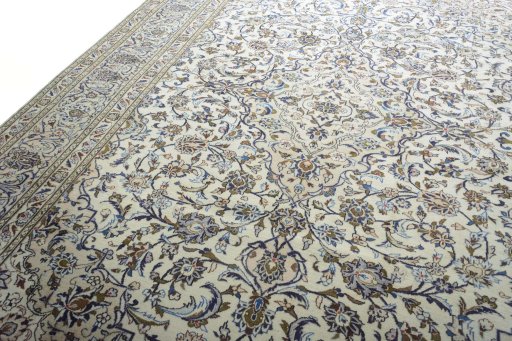 Backside of handmade 2000s Kashan rug showing knot structure and weave density