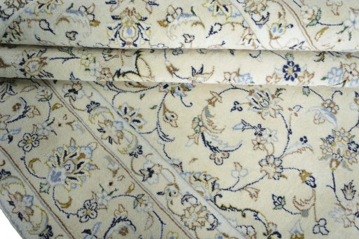 Close-up detail of New Kashan rug from Iran / Persia showing Wool weave