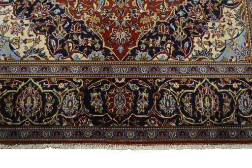 Full view of 2000s Kashan rug from Iran / Persia, 222 × 140 cm in Red tones