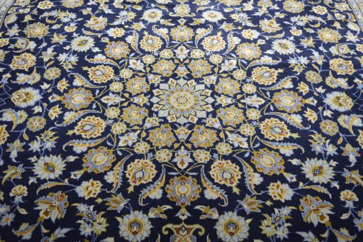 Central medallion detail of 2000s Kashan rug from Iran / Persia