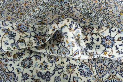 Surface texture of 2000s Kashan rug with natural Wool and intricate pattern