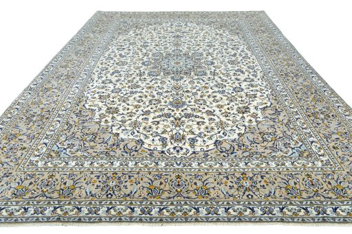 Surface texture of 2000s Kashan rug with natural Wool and intricate pattern